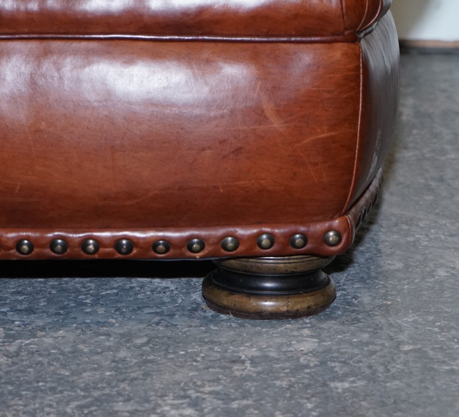 LOVELY VINTAGE BROWN LEATHER FOOTSTOOL FEATHER FILLED BRASS STUDS DETAIL