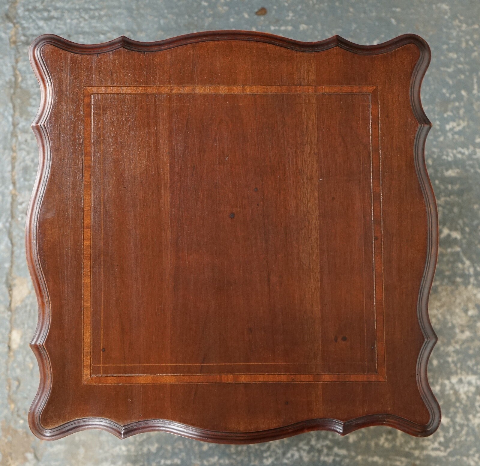 ANTIQUE EDWARDIAN REVOLVING BOOKCASE WITH A SERPENTINE SHAPED TOP