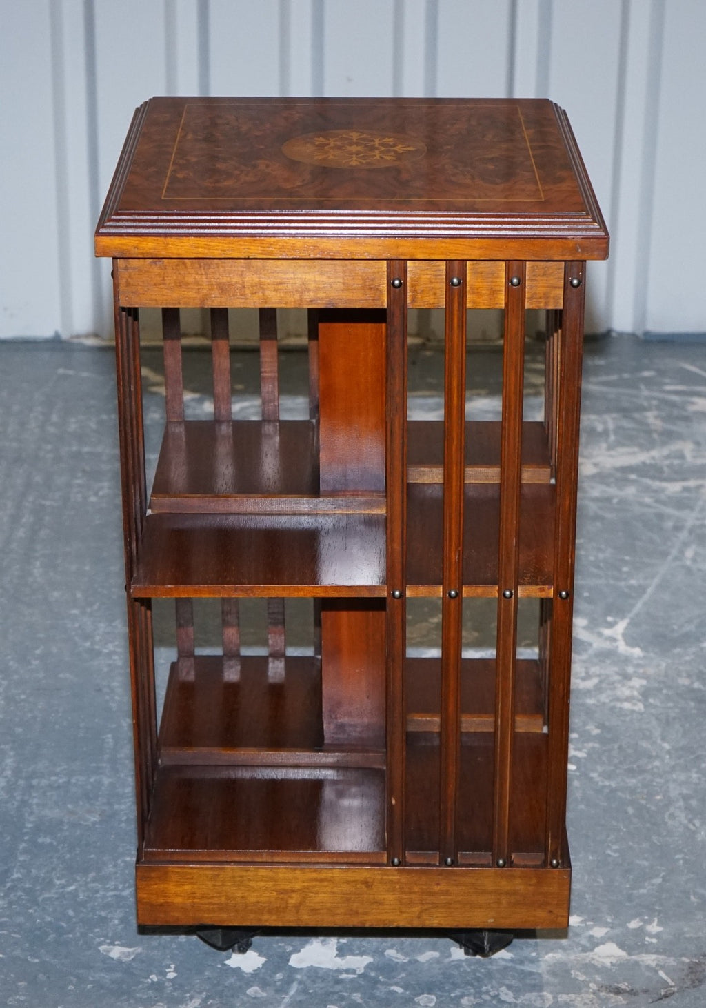 VINTAGE BURR WALNUT TOP REVOLVING BOOKCASE RAISED ON CASTORS