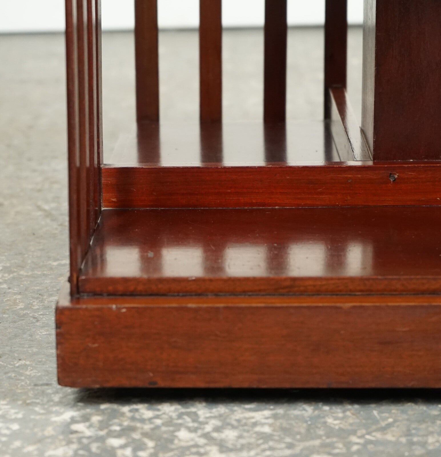 ANTIQUE EDWARDIAN REVOLVING BOOKCASE WITH A SERPENTINE SHAPED TOP
