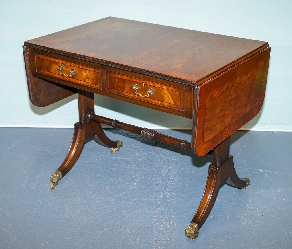 VINTAGE HARDWOOD DROP LEAF SIDE TABLE WITH SABER LEGS AND BRASS PAW FEET