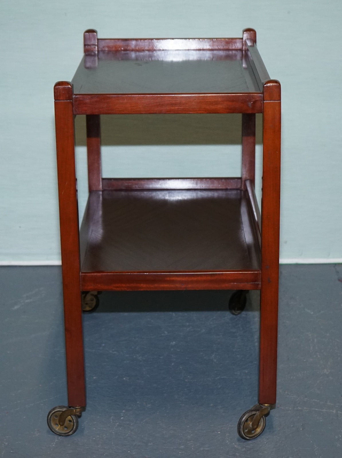 1960s VINTAGE TWO TIER WOODEN TEA TROLLET ON BRASS CASTERS