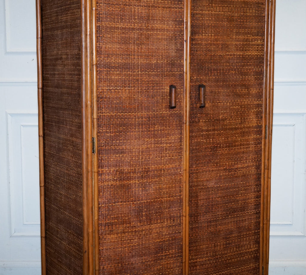 VINTAGE RATTAN AND CANE TWO DOOR AMOIRE OR WARDROBE WITH ONE DRAWER
