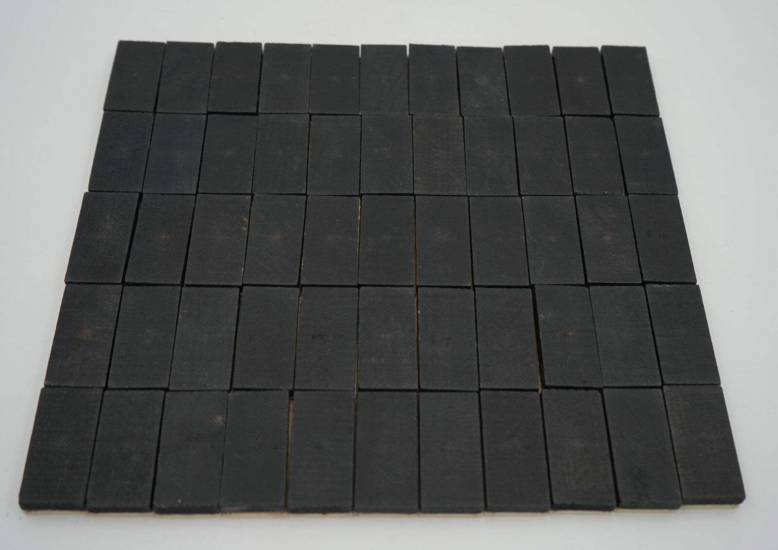 LATE 19TH CENTURY BOX OF TRADITIONAL GAME NINER DOMINOS WITH STUNNING PATINA
