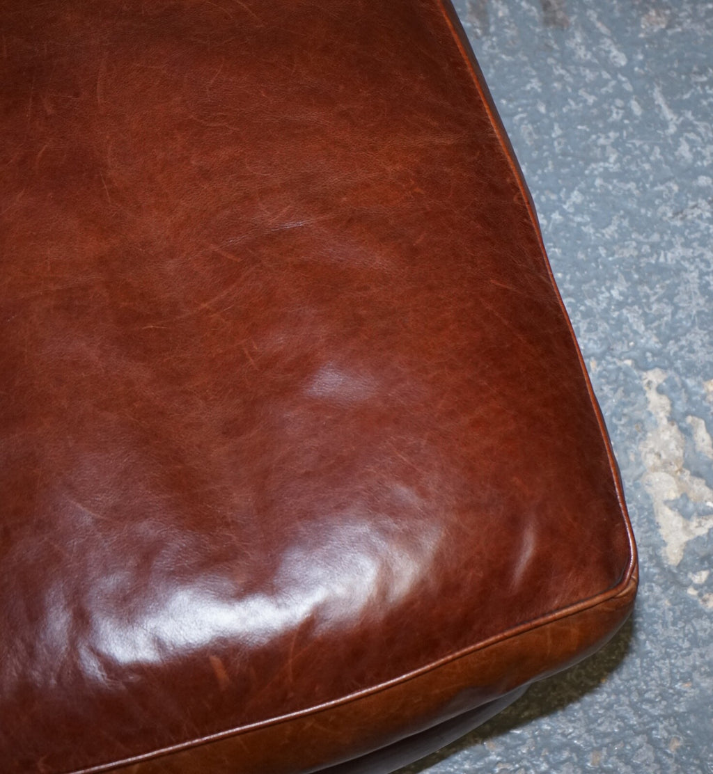 LOVELY VINTAGE BROWN LEATHER FOOTSTOOL FEATHER FILLED BRASS STUDS DETAIL
