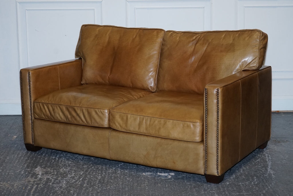 TIMOTHY OULTON HALO TWO SEATER VISCOUNT TAN LEATHER SOFA (1/2)