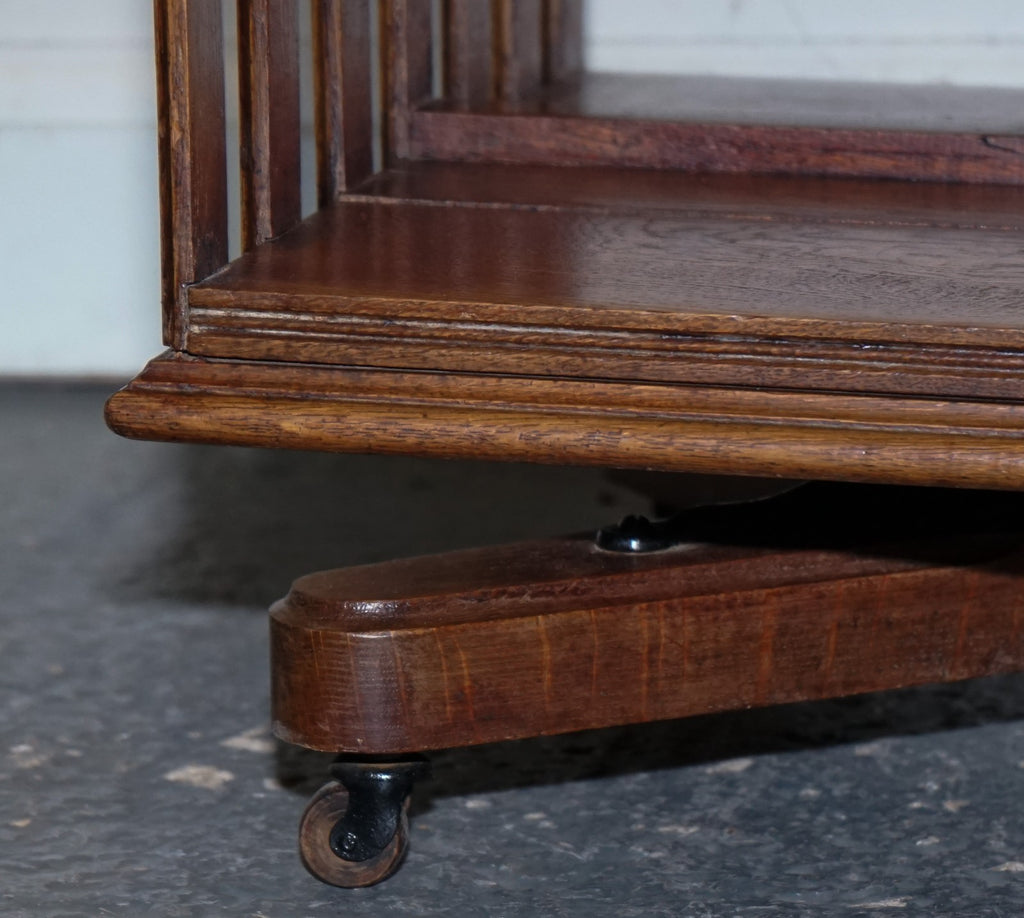 ANTIQUE SUBSTANTIAL OAK REVOLVING BOOKCASE WITH FOLDING READING STAND