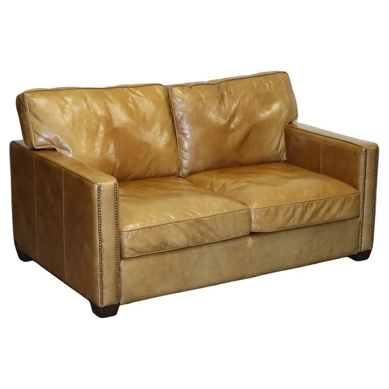 TIMOTHY OULTON HALO TWO SEATER VISCOUNT TAN LEATHER SOFA (1/2)
