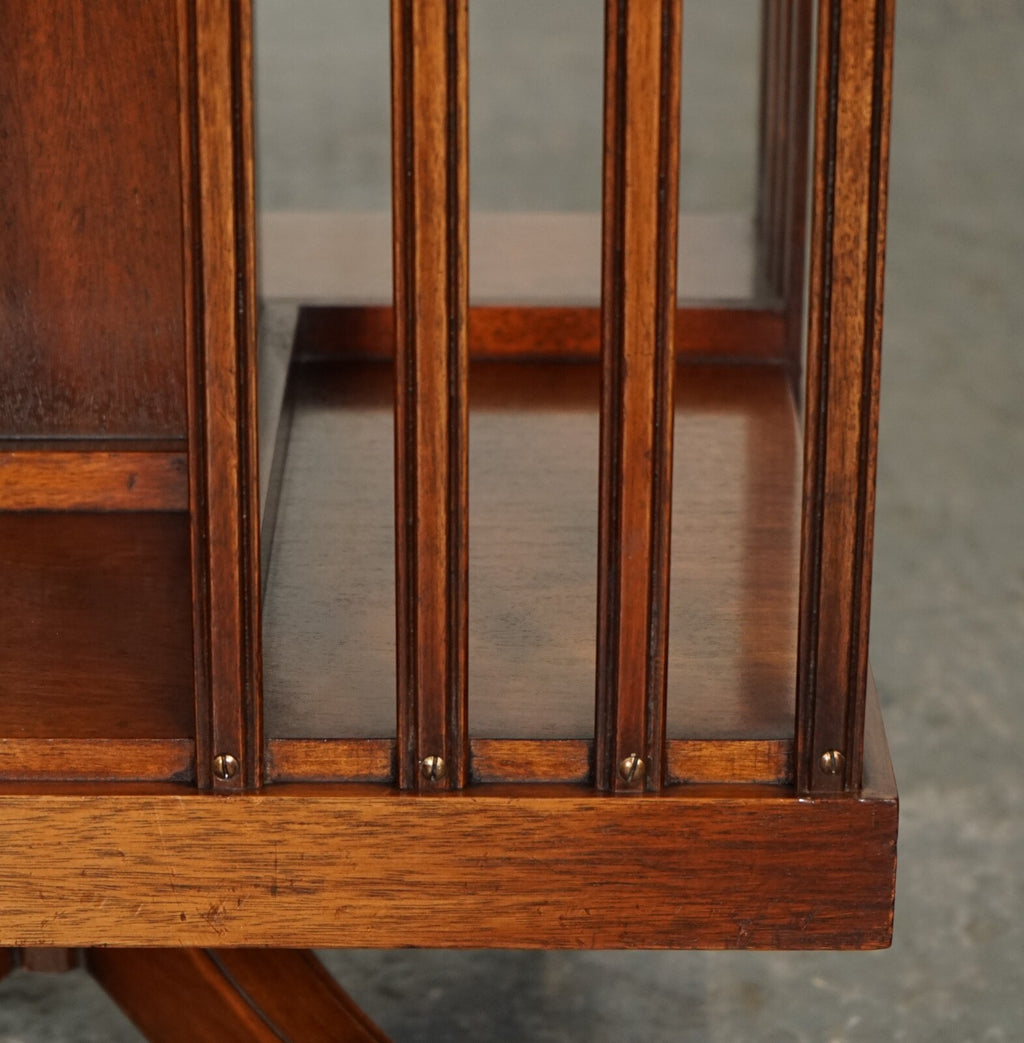 BEVAN FUNNEL REVOLVING BOOKCASE END TABLE RAISED ON BRASS CASTORS