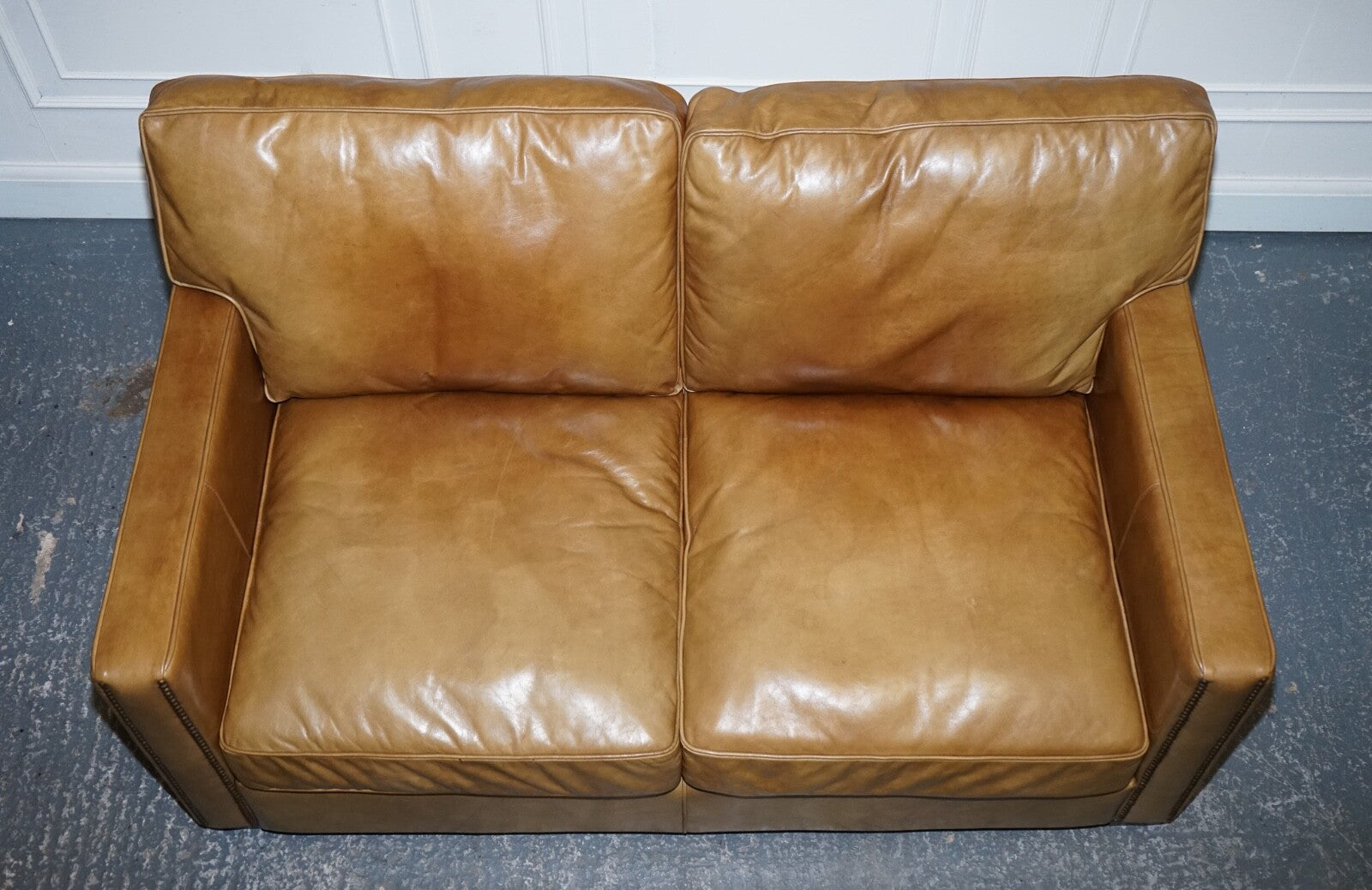 TIMOTHY OULTON HALO TWO SEATER VISCOUNT TAN LEATHER SOFA (1/2)