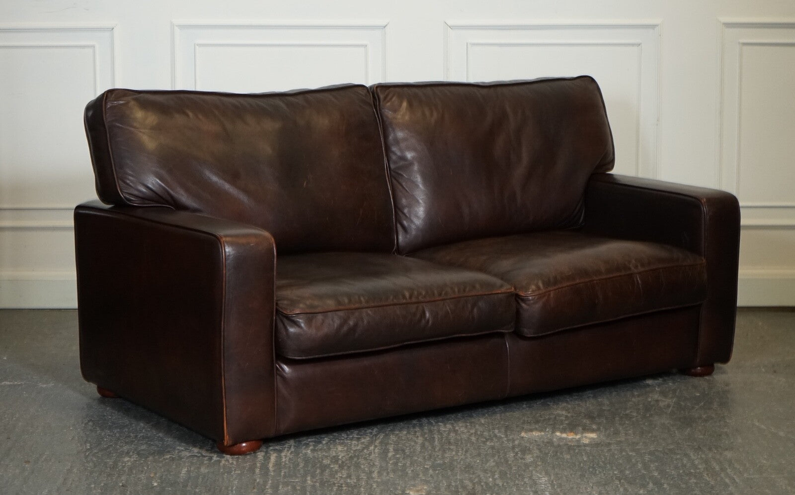 VINTAGE DISTRESSED BROWN LEATHER TWO TO THREE SEATER SOFA