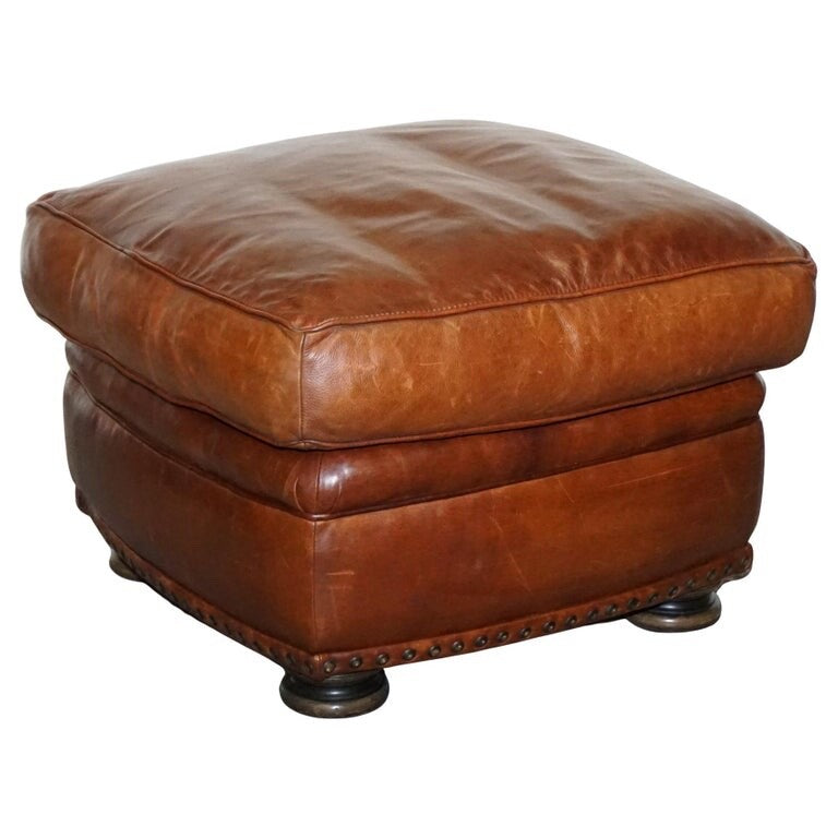 LOVELY VINTAGE BROWN LEATHER FOOTSTOOL FEATHER FILLED BRASS STUDS DETAIL