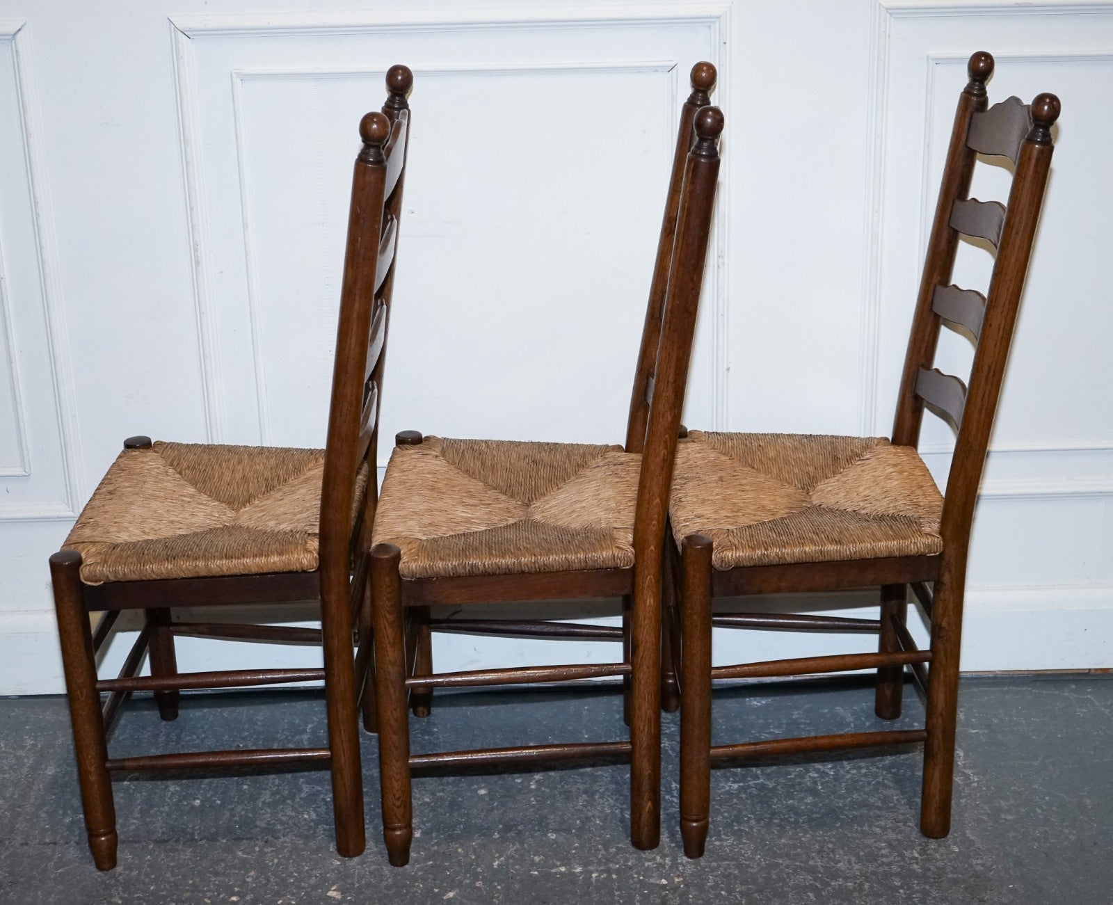 SET OF SIX ANTIQUE ENGLISH 19TH CENTURY LADDERBACK RUSH SEAT DINING CHAIRS