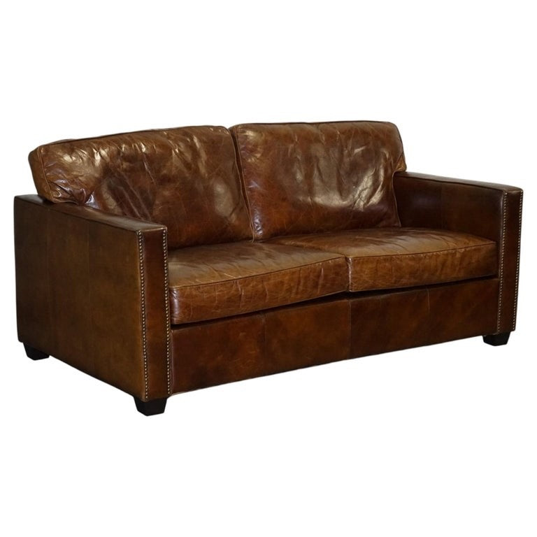 TIMOTHY OULTON VISCOUNT BROWN LEATHER TWO TO THREE SEATER COMPACT SOFA