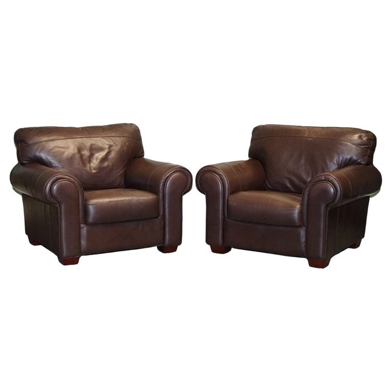 PAIR OF LARGE COMFORTABLE BROWN LEATHER ARMCHAIRS, MATCHING SOFA AVAILABLE