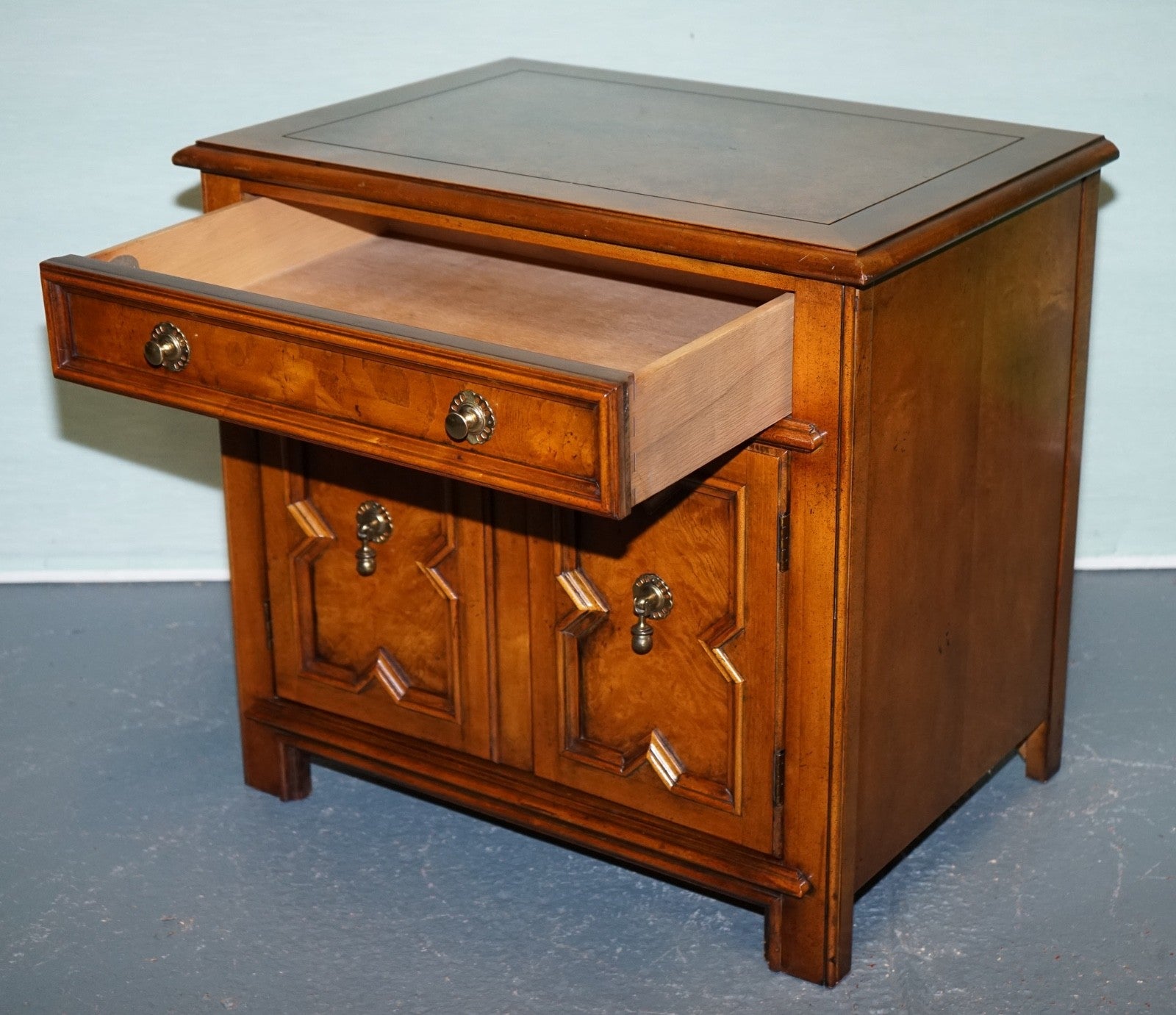 BAKER FURNITURE BURR WALNUT BEDSIDE CABINET WITH DRAWER AND CARVED DOORS