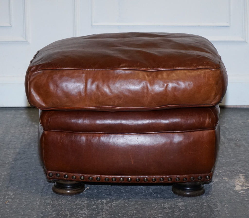 LOVELY VINTAGE BROWN LEATHER FOOTSTOOL FEATHER FILLED BRASS STUDS DETAIL