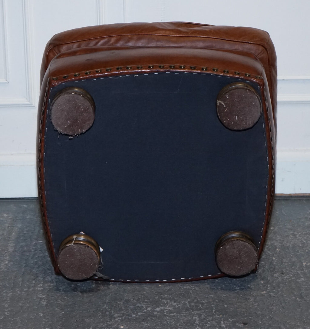 LOVELY VINTAGE BROWN LEATHER FOOTSTOOL FEATHER FILLED BRASS STUDS DETAIL