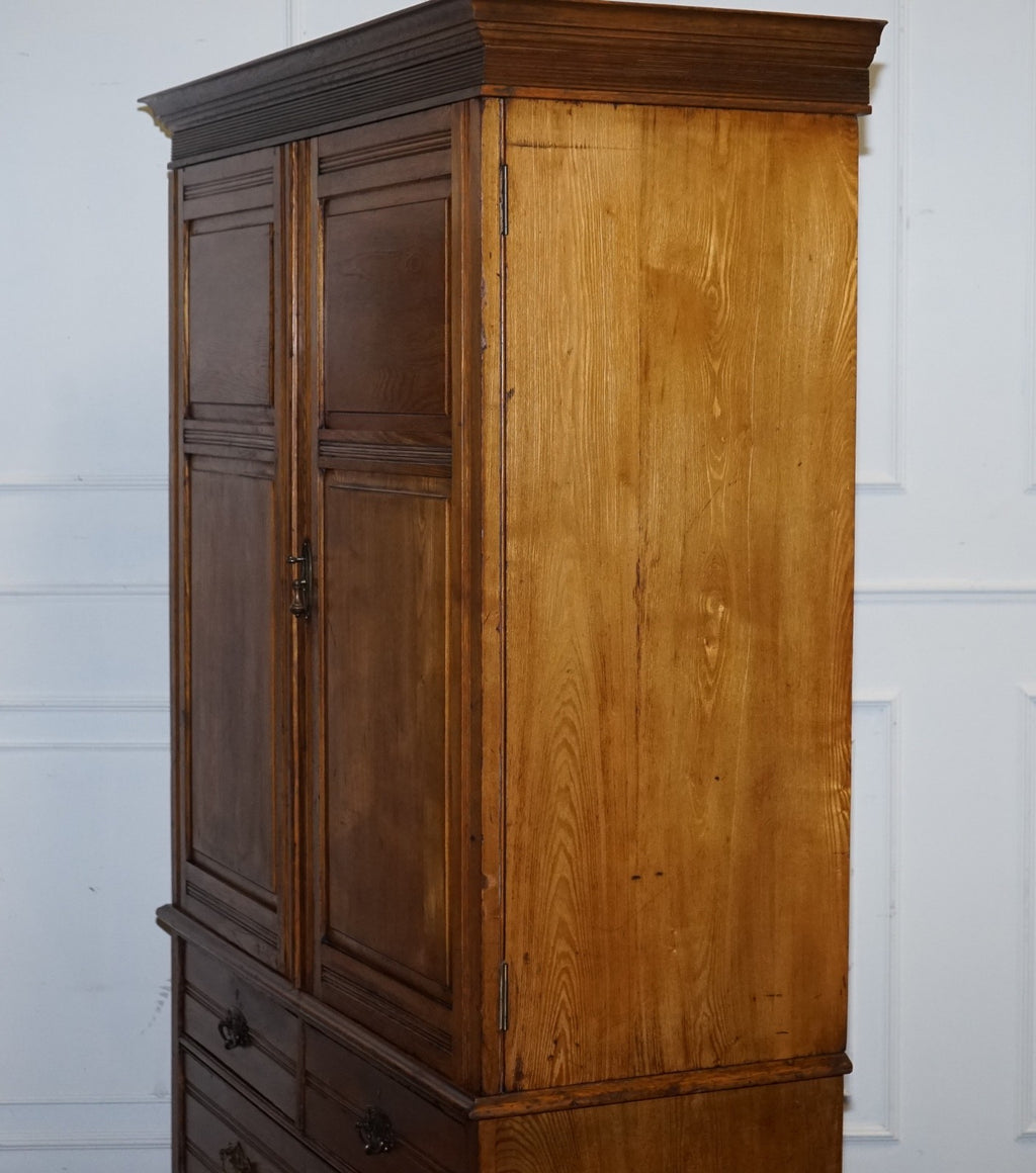 ANTIQUE VICTORIAN ENGLISH OAK LINEN PRESS WARDROBE WITH FOUR DRAWERS
