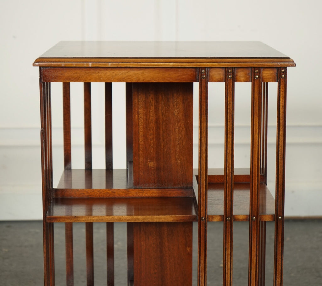 BEVAN FUNNEL REVOLVING BOOKCASE END TABLE RAISED ON BRASS CASTORS