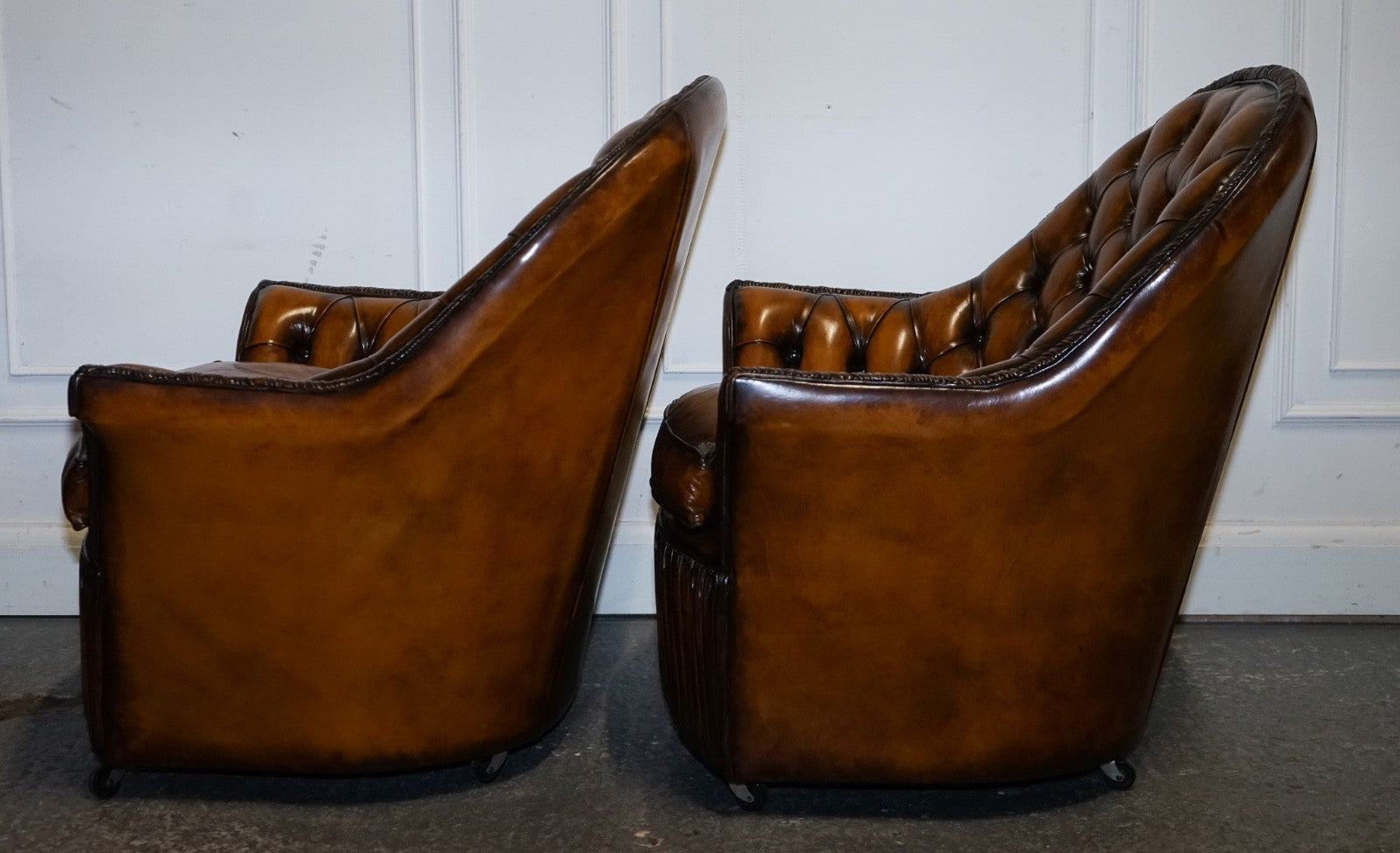 RARE PAIR OF BROWN HAND DYED LEATHER CHESTERFIELD ARMCHAIRS WITH PLEATED FRONT