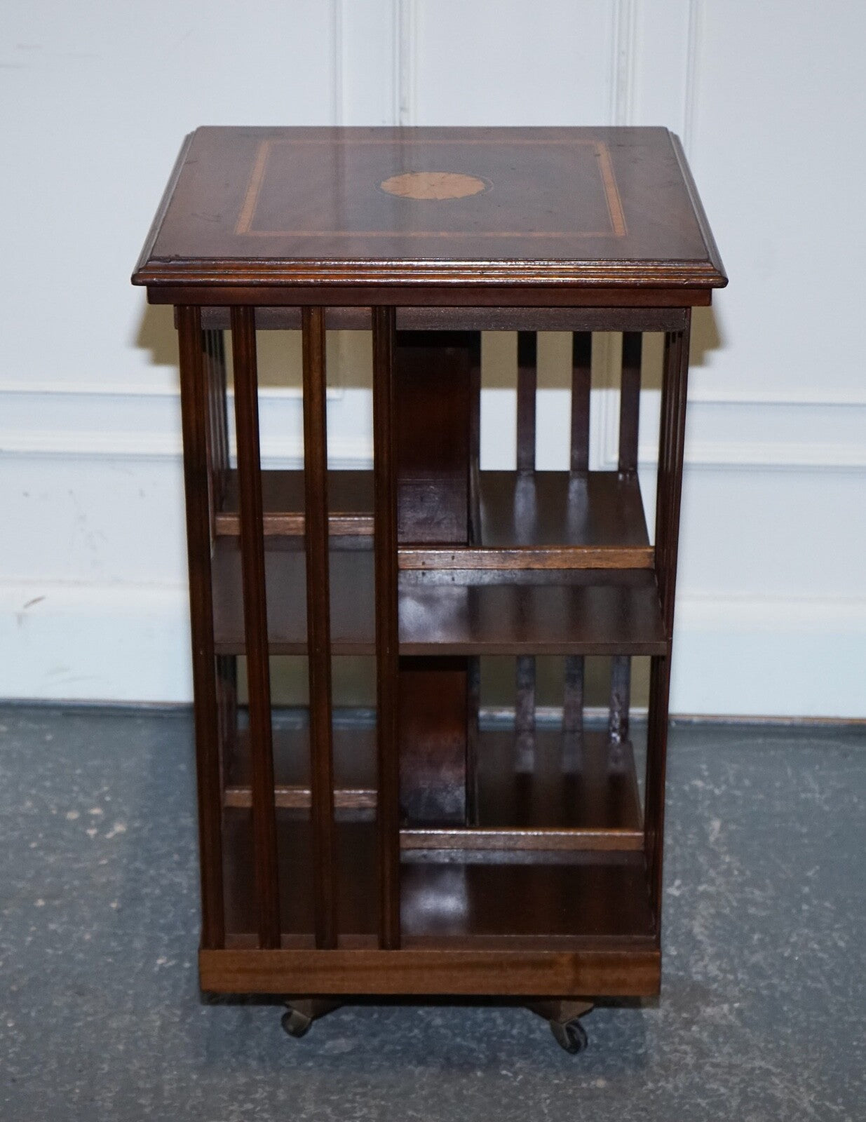 MID CENTRY SHERATON REVIVAL INLAID REVOLVING BOOKCASE END TABLE ON CASTORS