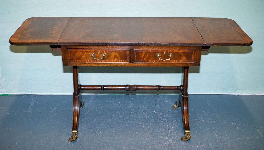 VINTAGE HARDWOOD DROP LEAF SIDE TABLE WITH SABER LEGS AND BRASS PAW FEET