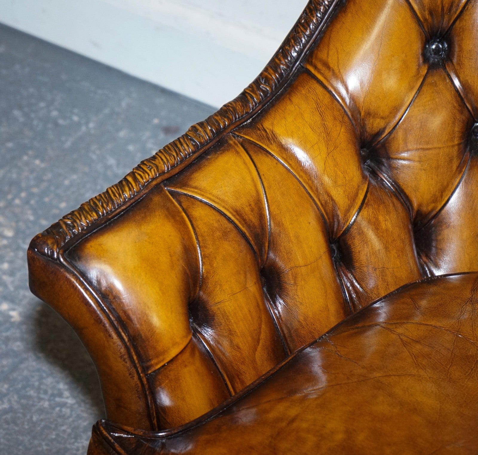 RARE PAIR OF BROWN HAND DYED LEATHER CHESTERFIELD ARMCHAIRS WITH PLEATED FRONT