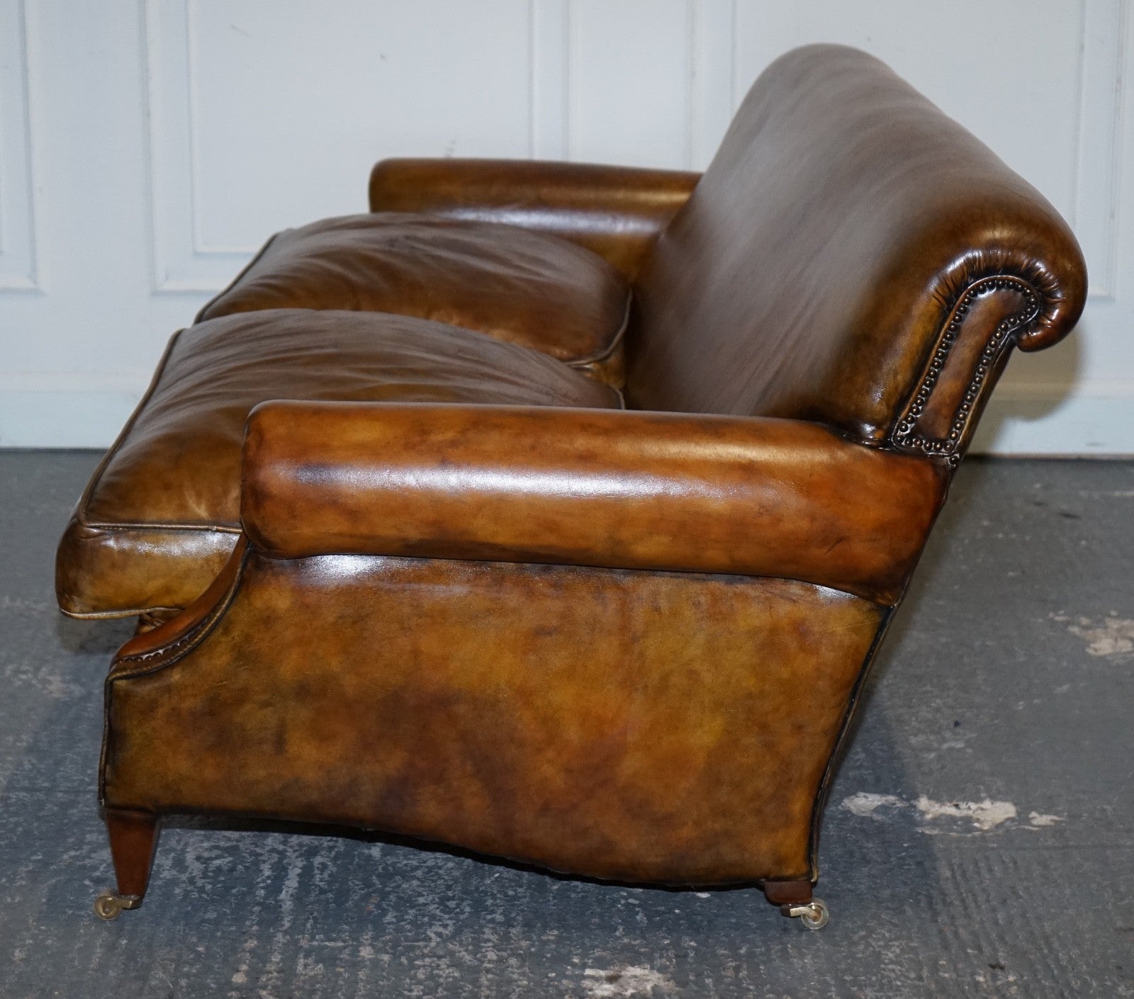ENGLISH RESTORED HAND DYED LEATHER TWO TO THREE SEATER SOFA