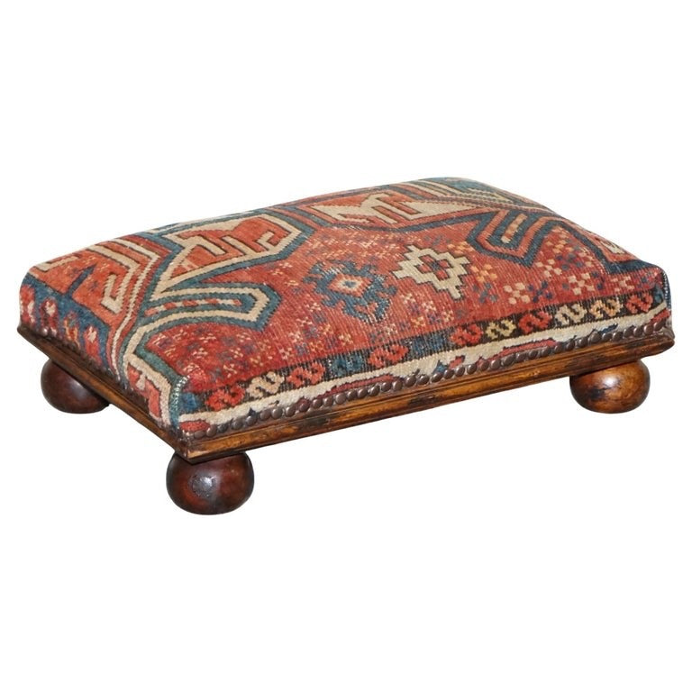 ANTIQUE KILIM TRIBAL RUG UPHOLSTERED FOOTSTOOL RAISED ON BUN FEET WITH ...