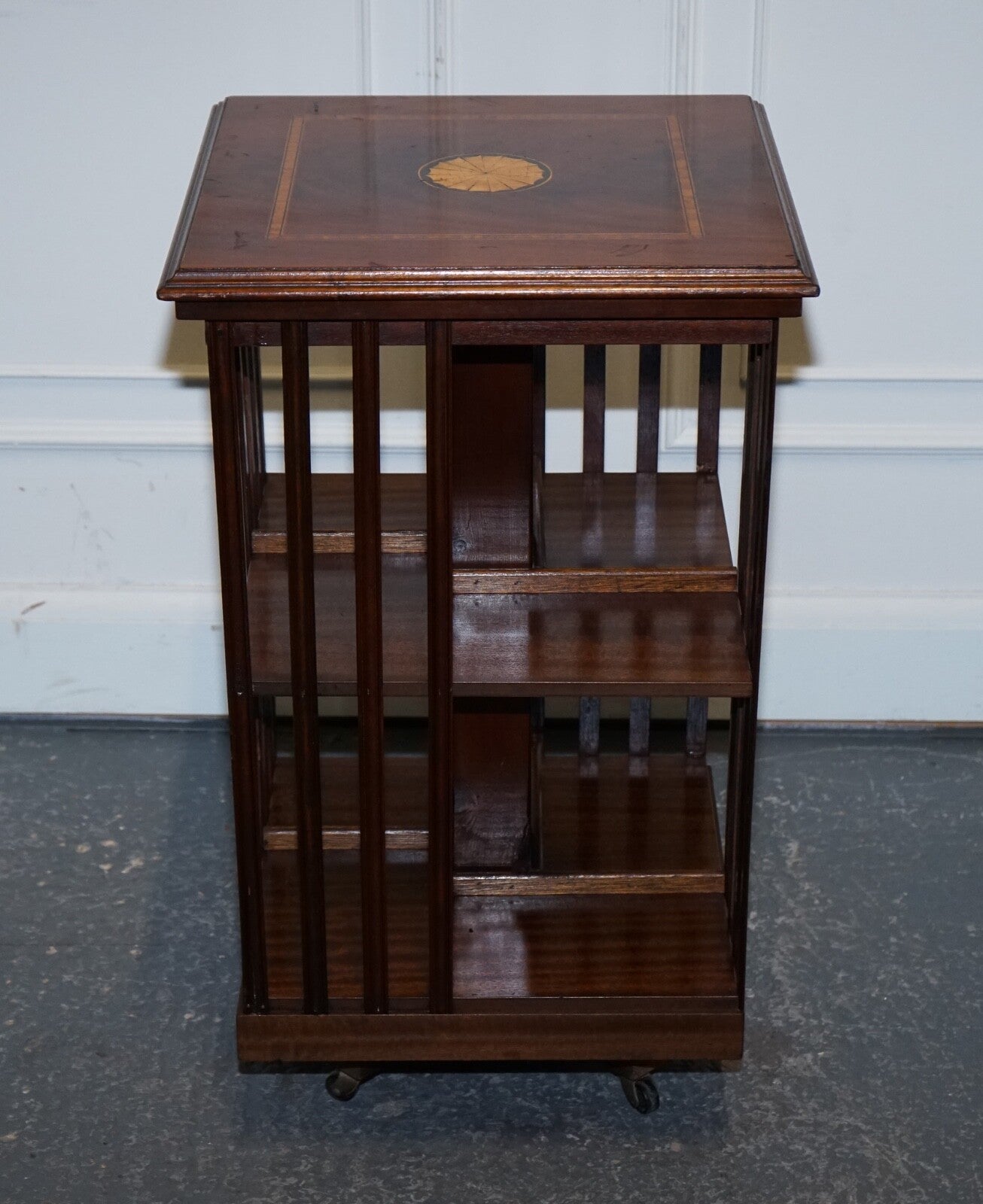 MID CENTRY SHERATON REVIVAL INLAID REVOLVING BOOKCASE END TABLE ON CASTORS