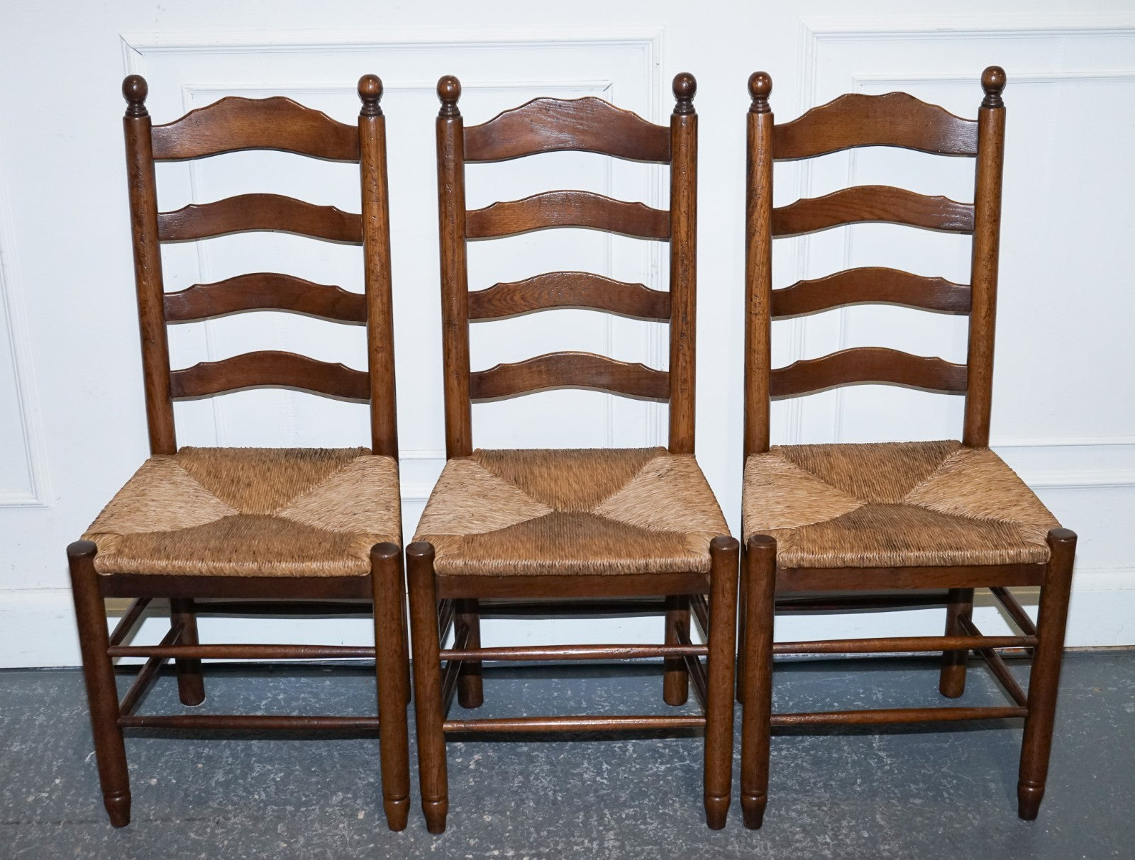 SET OF SIX ANTIQUE ENGLISH 19TH CENTURY LADDERBACK RUSH SEAT DINING CHAIRS