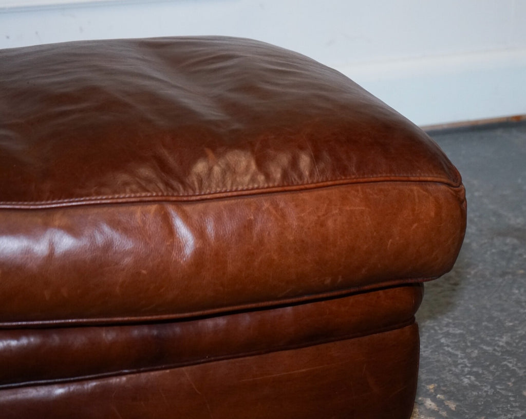 LOVELY VINTAGE BROWN LEATHER FOOTSTOOL FEATHER FILLED BRASS STUDS DETAIL