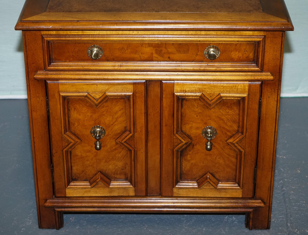BAKER FURNITURE BURR WALNUT BEDSIDE CABINET WITH DRAWER AND CARVED DOORS