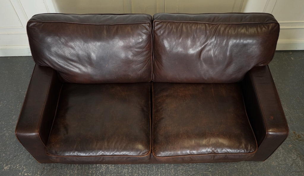 VINTAGE DISTRESSED BROWN LEATHER TWO TO THREE SEATER SOFA