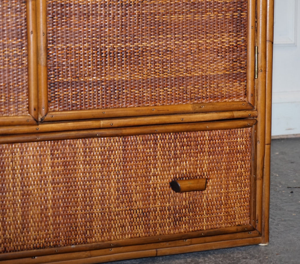 VINTAGE RATTAN AND CANE TWO DOOR AMOIRE OR WARDROBE WITH ONE DRAWER