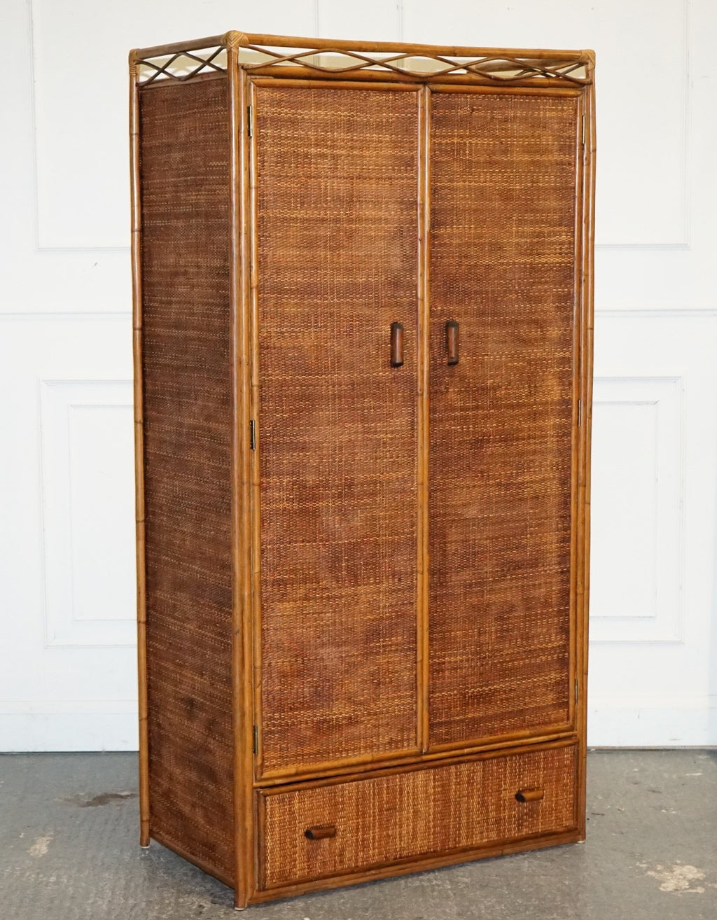 VINTAGE RATTAN AND CANE TWO DOOR AMOIRE OR WARDROBE WITH ONE DRAWER