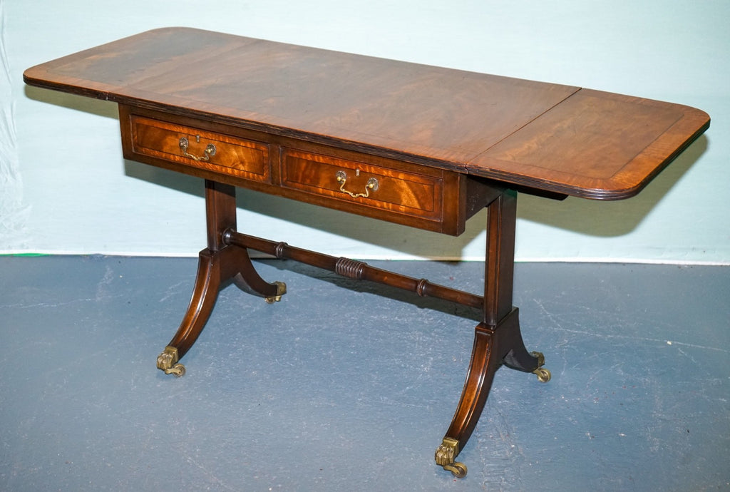 VINTAGE HARDWOOD DROP LEAF SIDE TABLE WITH SABER LEGS AND BRASS PAW FEET