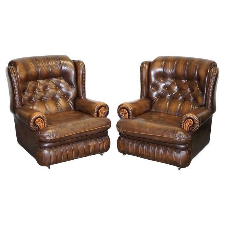 VINTAGE PAIR OF BRITISH MADE BROWN AGED LEATHER MONK CHESTERFIELD ARMCHAIRS