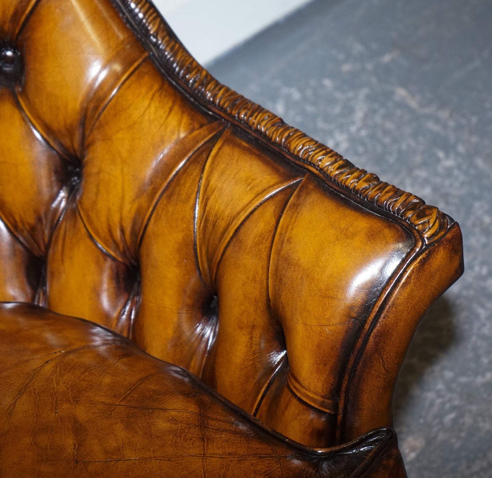 RARE PAIR OF BROWN HAND DYED LEATHER CHESTERFIELD ARMCHAIRS WITH PLEATED FRONT