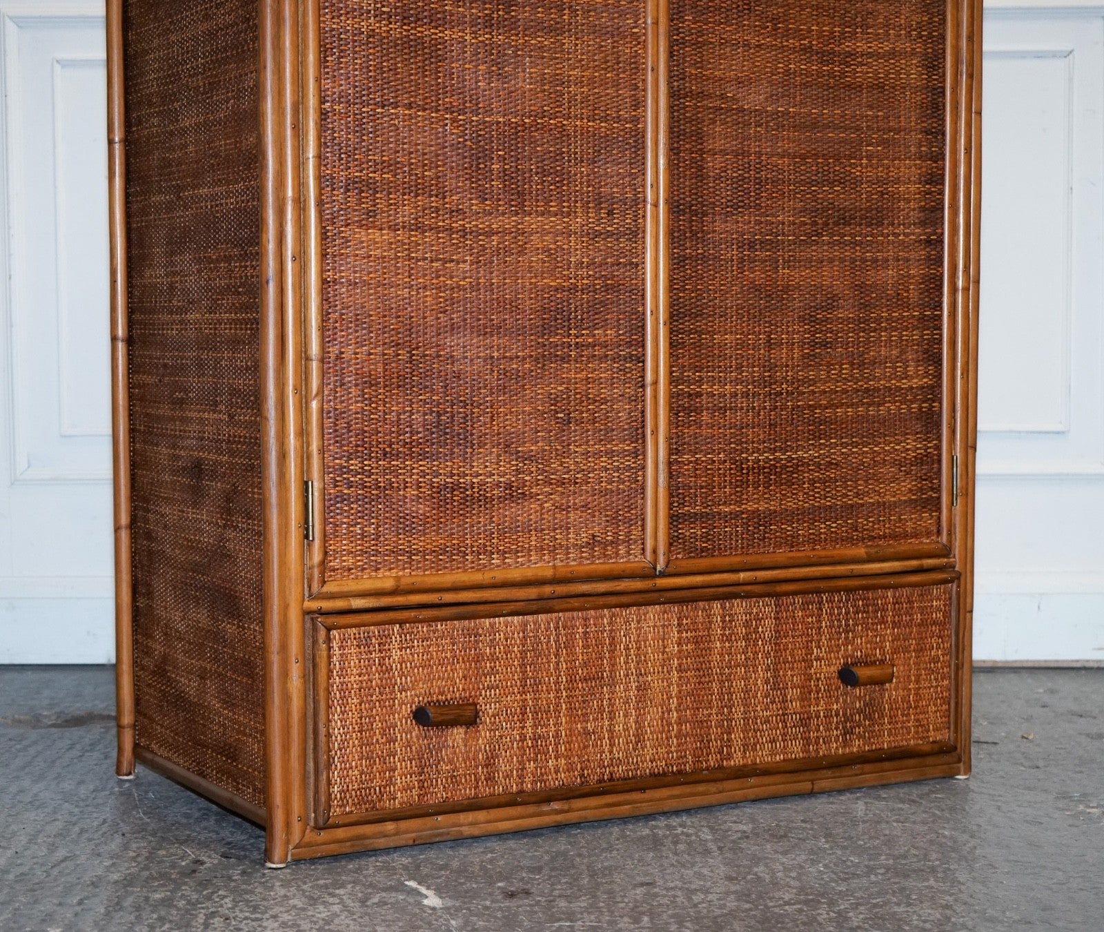 VINTAGE RATTAN AND CANE TWO DOOR AMOIRE OR WARDROBE WITH ONE DRAWER