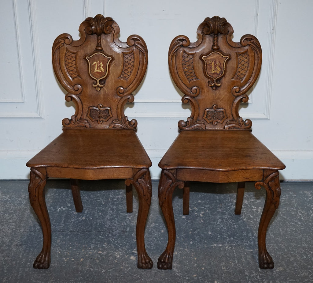 ANTIQUE PAIR OF VICTORIAN SOLID OAK CARVED HALLWAY CHAIRS WITH LION PAW FEET