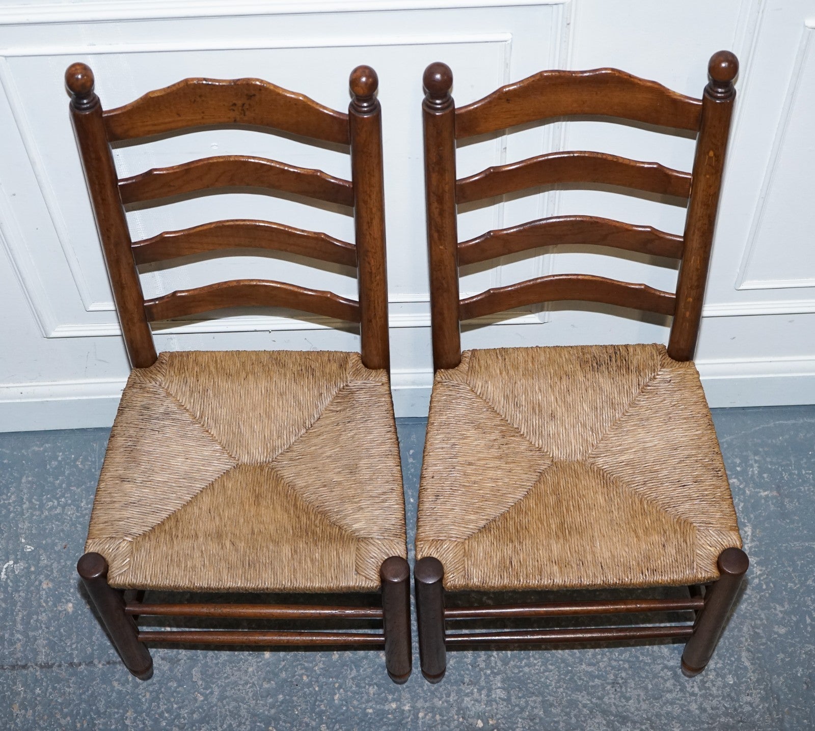 SET OF SIX ANTIQUE ENGLISH 19TH CENTURY LADDERBACK RUSH SEAT DINING CHAIRS
