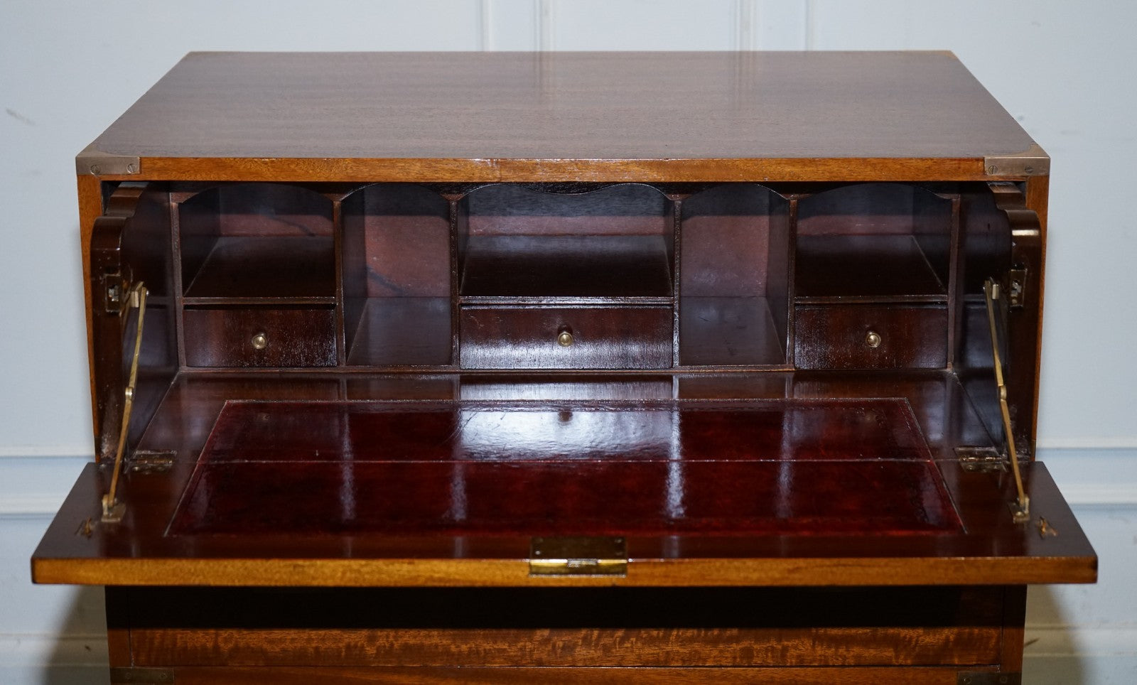 VINTAGE MILITARY CAMPAIGN SECRETAIRE CHEST OF DRAWERS WITH AGED RED LEATHER