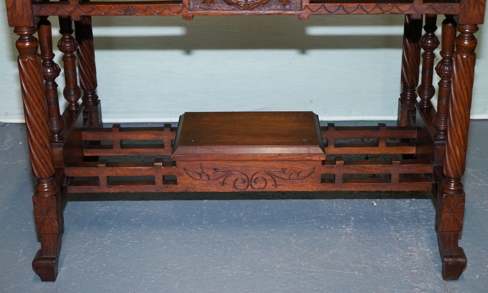 LATE 19TH CENTURY CONTINENTAL CARVED WALNUT WRITING TABLE LEATHER INLAY TOP