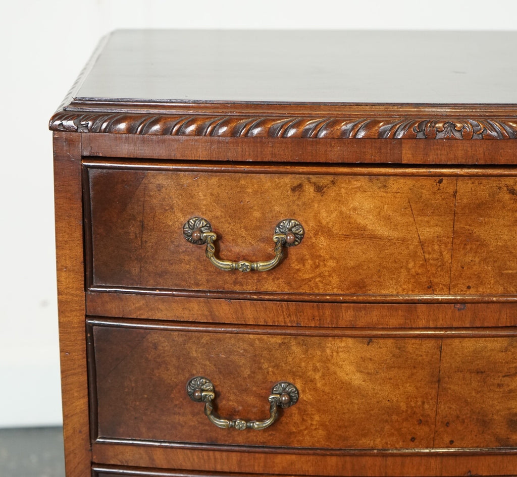 FIGURED VICTORIAN WALNUT BOW FRONTED CHEST OF DRAWERS RAISED ON QUEEN ANNE LEGS