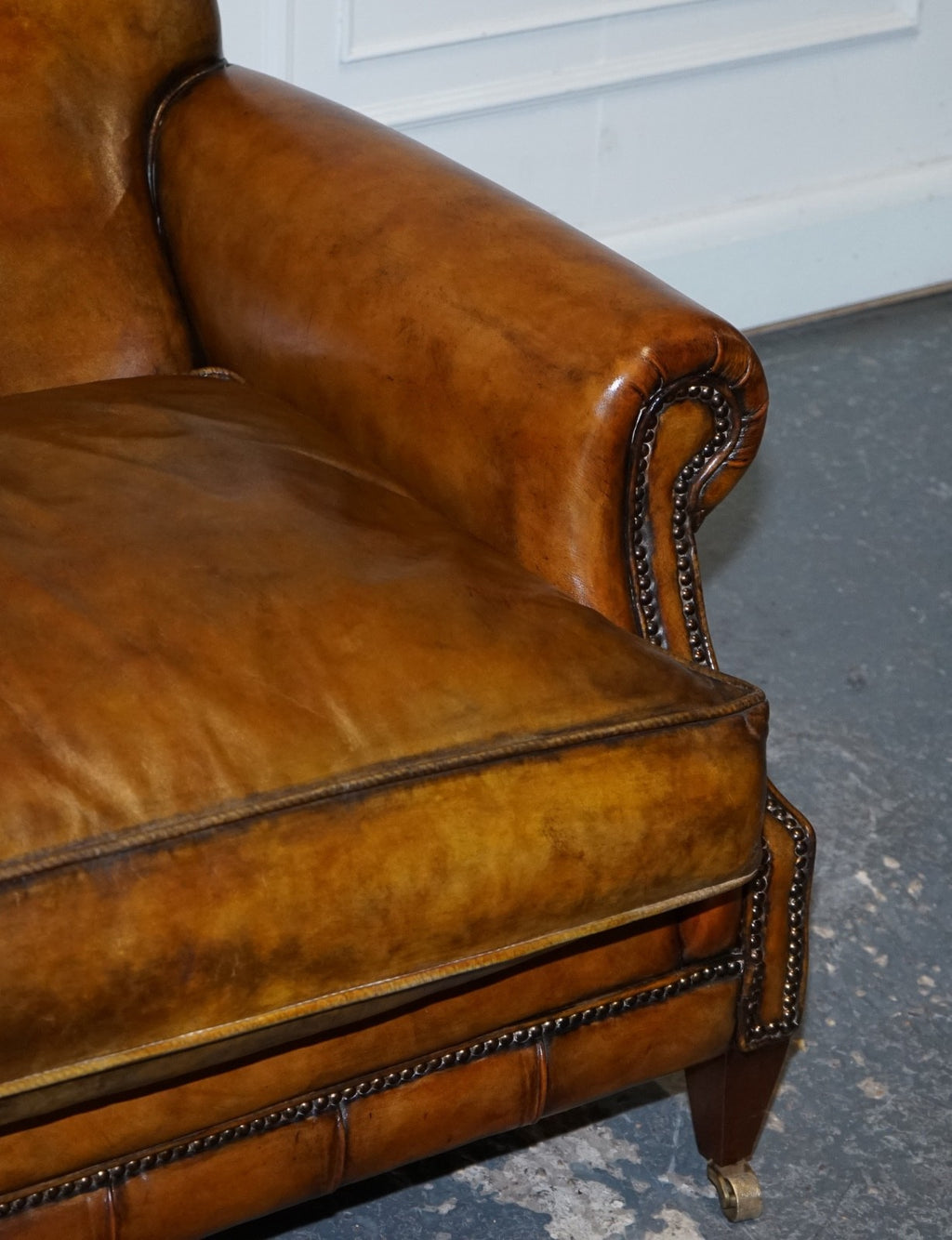 ENGLISH RESTORED HAND DYED LEATHER TWO TO THREE SEATER SOFA