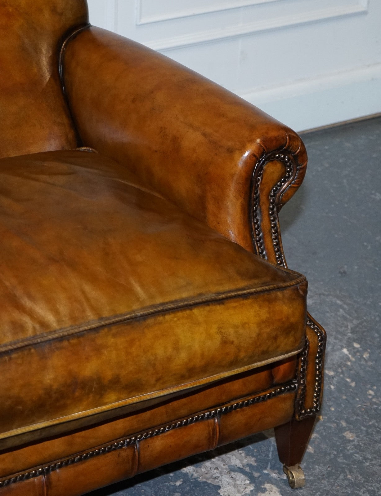 ENGLISH RESTORED HAND DYED LEATHER TWO TO THREE SEATER SOFA