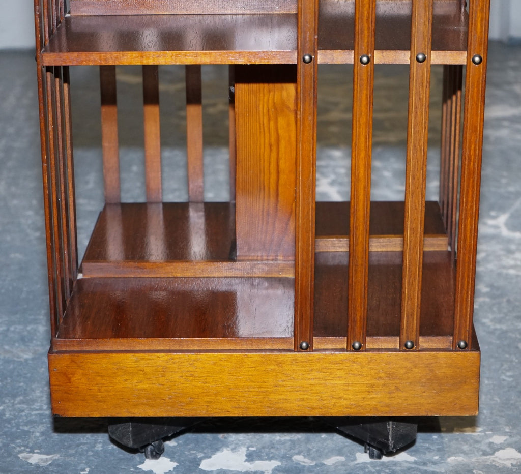 VINTAGE BURR WALNUT TOP REVOLVING BOOKCASE RAISED ON CASTORS