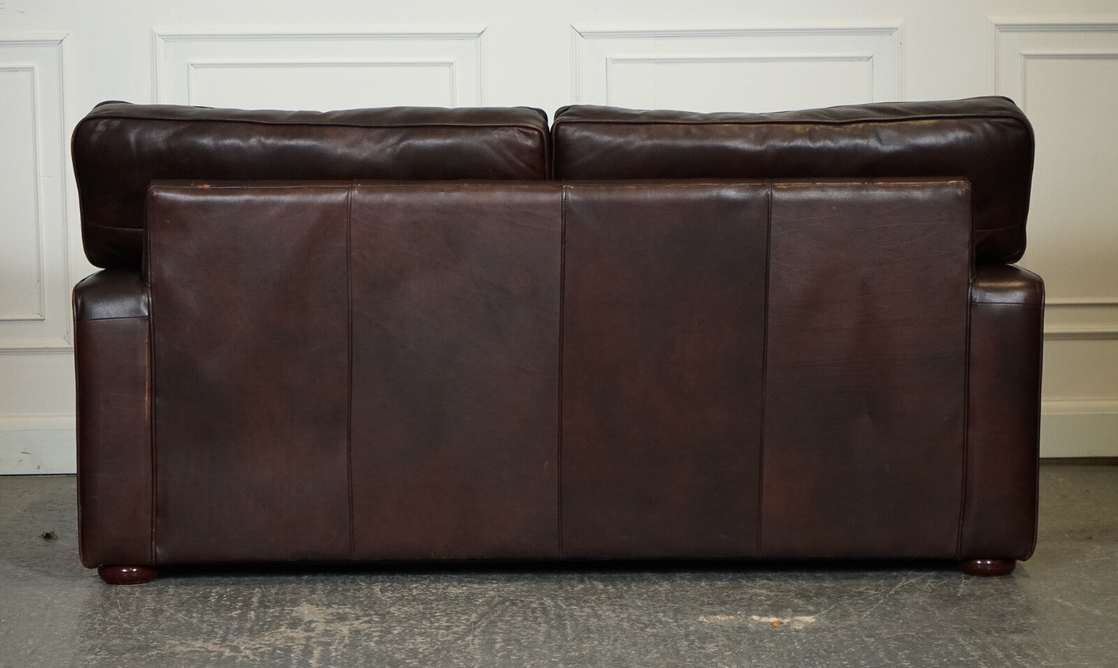 VINTAGE DISTRESSED BROWN LEATHER TWO TO THREE SEATER SOFA